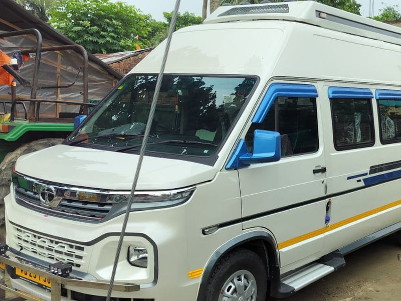 White Tata Winger tempo traveller